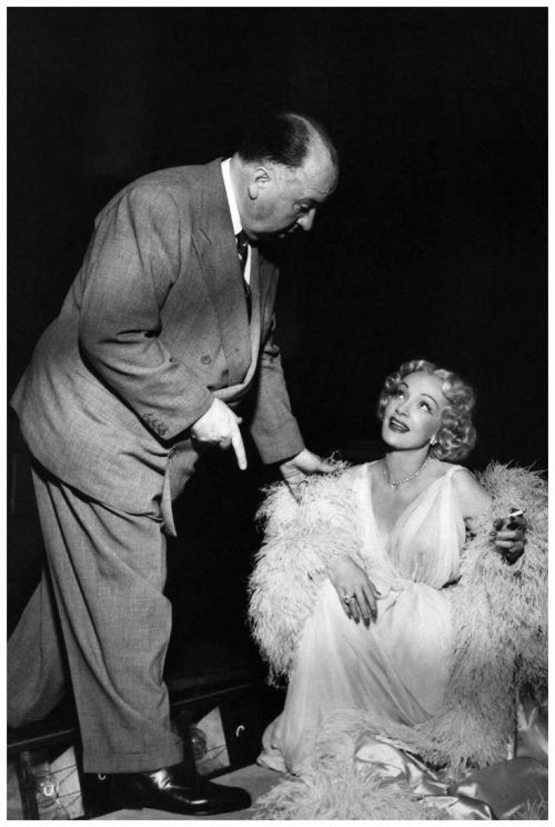 theniftyfifties:  Alfred Hitchcock and Marlene Dietrich on the set of ‘Stage Fright’, 1959.