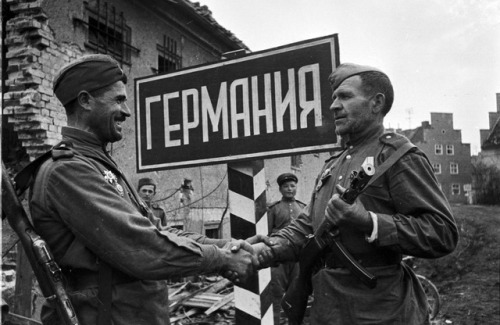 Soviet soldiers meet at the German border