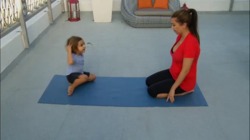 veebeautiful:  Kourtney and Mason doing Yoga