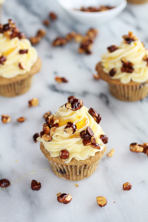 foodishouldnoteat:  Honey Toasted Hazelnut Chocolate Chunk Cupcakes with Boozy Honey Buttercream Frosting