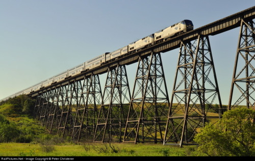 aryburn-trains:Westbound Empire Builder on the Gassman Coulee Trestle in the morning sun. The bridge