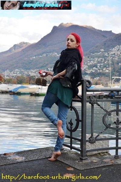 Second issue (PHOTOSET   VIDEO) of a brand-new special feature at BAREFOOT URBAN GIRLS! Subscribers have the chance to enjoy the gorgeous 24/7/365 barefoot beauty RED-X in her new hometown Lugano (Switzerland), where she is now working (barefooted,