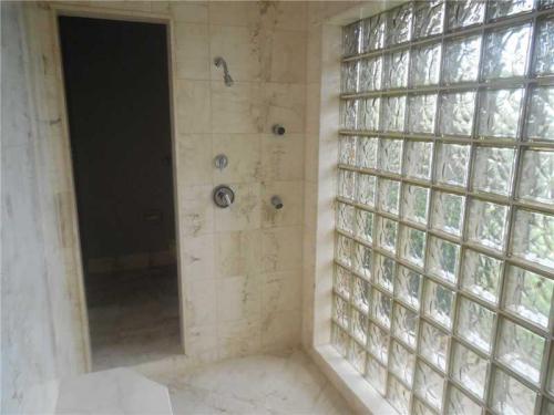 Post #1641983 house for sale - 17674 Scarsdale Way, Boca Raton, Fla.Peep the smoked glass block!