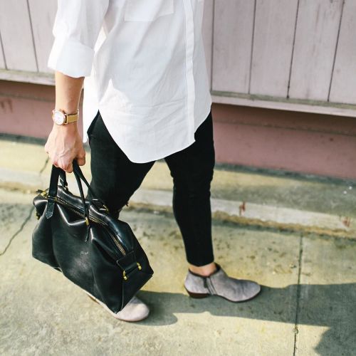 The essentials to life no matter who you are: boyfriend white button down, black skinnies, ankle boo