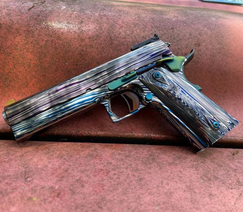 The JJFU “Pont” Full Damascus 1911.JJFU TearDropped Bull Barrel Chambered in 45acpFull Frame Slab si