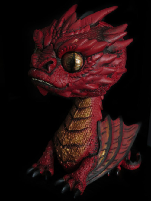 (Bou’s Note:  I don’t know who did this amazing re-paint of their Tiny Smaug, but damn, I need it!)S