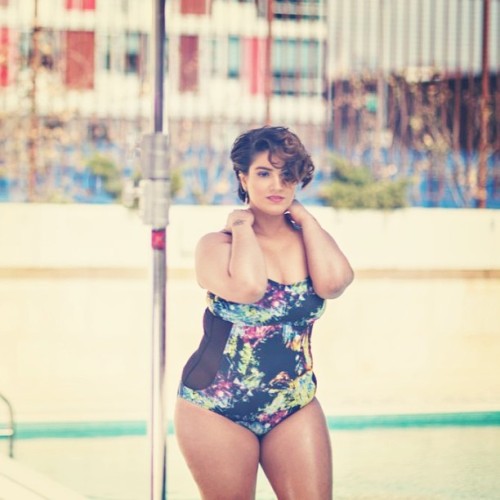 nadiaaboulhosn:  Tan skin, brown hair and she know they talking but she never gon’ care. #swimsuit #photoshoot #oiledup