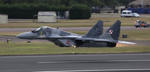 planesawesome:MiG-29 low, copyrights: jonathan young.