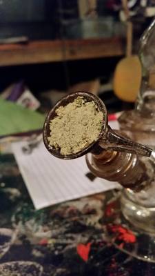reddlr-trees:  Me and my buddy taking this to the face. It’s a layer of bud, keif, bud, and toped off with keif. 