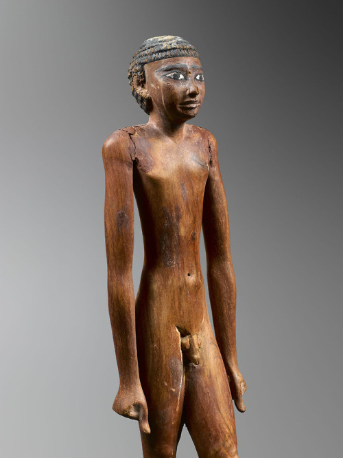 Statuette of a nude man (wood and pigment). Late Old Kingdom, 6th-8th Dynasty, ca. 2345-2160 BC. Ex 
