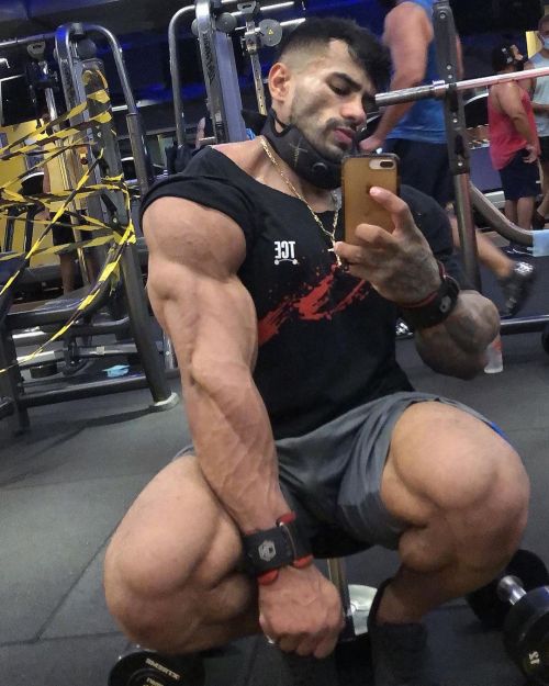 muscleobsessive:Itemberg Nunes. Love this dude partly because he reminds me of Brazilian bodybuilder Samuel Vieira, who used to do stuff for Musclehunks back in the day. Same outrageously hot Latino looks: huge pecs, huge pout, thick bristly beard. He’s