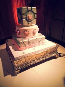 spooks16:  cakeybots:  bishounenizer:  I was excited and extremely pleased I was able to get a Companion cube wedding cake! It turned out soooo nice.  We cut the cake to a cover of ‘Still Alive’, only my friends got the joke, but it was an epic moment