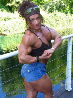 zimbo4444:  ..Colette Guimond..incredible big beautiful sexy muscle ..19″ biceps..super pecs..perfect onion..huge juicy quads..luscious 4″ clit..phenomenal strength..did I mention she speaks French..just an ideal woman..   💪🏼😻👍🏼  