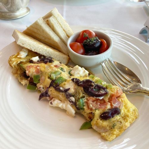 Greek omelette with kalamata olives, feta cheese, tomato, green peppers.  Athens, GR  @hotelgrandebr