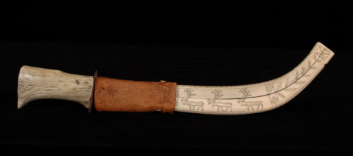 Inuit hunting knife with intricately scrimshawed caribou horn sheath, Northwest Territorry Canada, 1