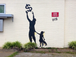 elitecrowd:  Street art found on an abandoned bank in Virginia Beach, VA. 