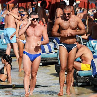 famousmeat:  Luke Evans’ speedo bulge at the beach with male companion in Mykonos 