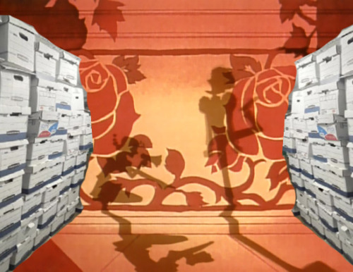 The Shadow Play Girls performing surrounded by a bunch of photoshopped suspicious looking boxes that may or may not contain government documents and classified information