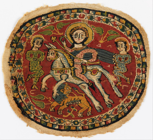 Coptic medallion with polychrome figures on a red ground. The image is said to represent the Byzanti