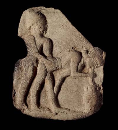 Ancient Babylonian terracotta plaque depicting beer and sex, circa 1800 BC.