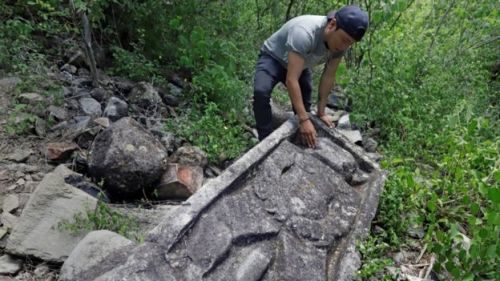 Local people discovered a collection of rock carvings on top of the Cerro de Peña, a mountain in cen