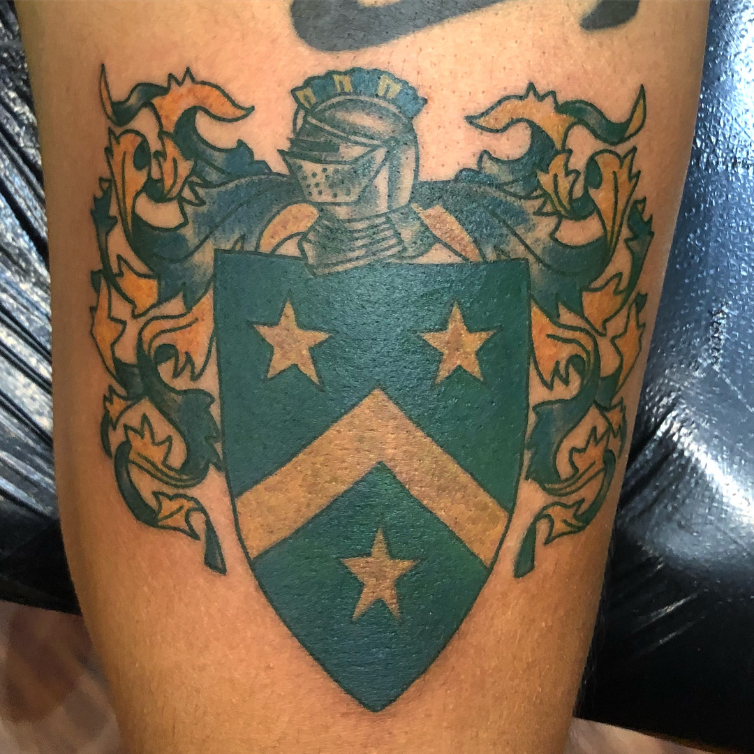 family crest tattoo by Galen Luker TattooNOW