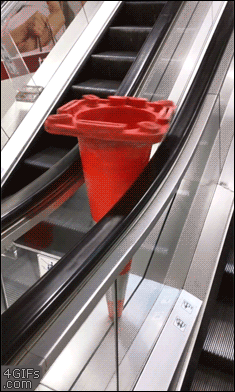 loopedgifs: A cone in an escalator 