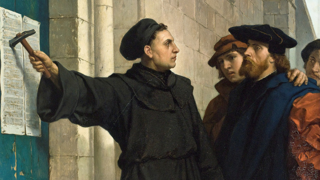 image of martin luthet nailing his 95 theses to the doors of the church