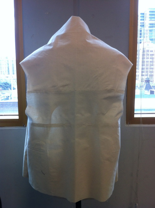 The ½ scale draped jacket is now transferred to full scale.  A long process converting all th