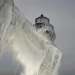 cosmicanger:🔥 Frozen lighthouse on Lake Michigan shore