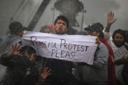 thepoliticalnotebook:  Protesters in New Delhi are hit with a police water cannon blast during their demonstration following the brutal gang rape of a 23-year-old woman, which has sparked  powerful protests in India’s capital in recent days. [Saurabh