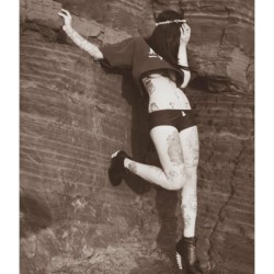 nekomarie:  Another oldie but goodie by @grystagram to cure your weekday-itis! :p #model #photoshoot #boobslip #tattoos #rockywall #heels #bones #skin #greyscale #blackwhite 