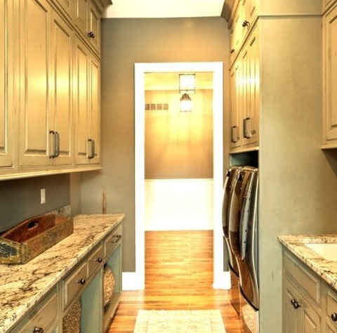 Cincinnati Laundry Laundry RoomLarge Traditional Galley With A Dark Wood Floor And A Brown Floor And
