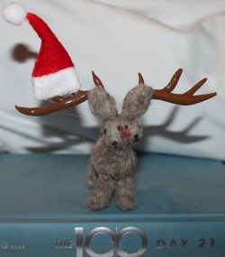 pothepolarbear:  the100writers want Christmas fanart so I put a Santa hat on the two-headed deer I made. Happy holidays!   See? This just makes us happy.