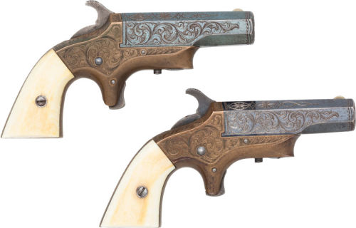 Rare set of factory engraved Southerner single shot derringers, .41 caliber, ivory grips. Sold at au