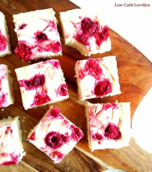 Lemon, Raspberry & Coconut Cheesecake BarsThis lovely low carb lemon cheesecake is popping with 