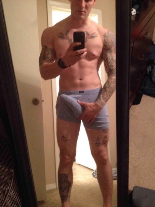 queerclick:See the tats on his ass up close. Plus he lets out his stiff erected cock.