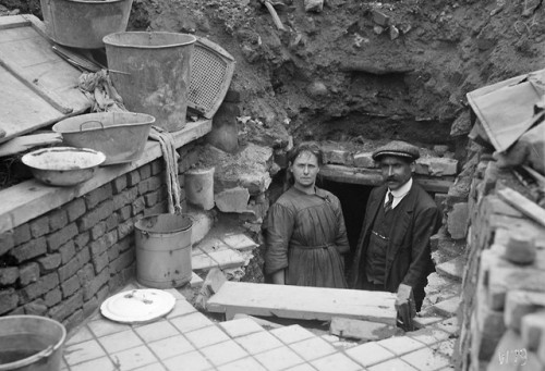 Original caption: “Lens, France, April 11, 1919. Man and wife,living in cellar of their former