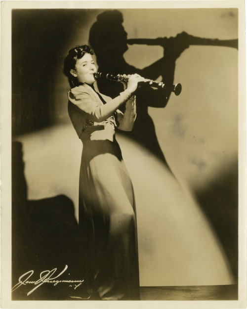 Ann Dupont, clarinet player and swing band leader (c.1940). Vintage sepia tone photograph.United Sta