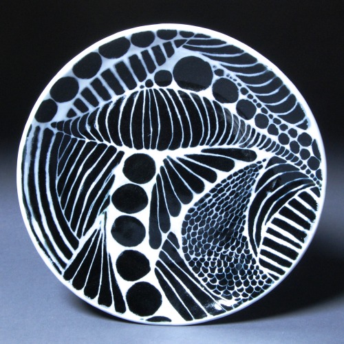 Glaze-Carved Dinner Plates, 2014by Emily Rose Bourne Thrown porcelain with black and white glazes fi
