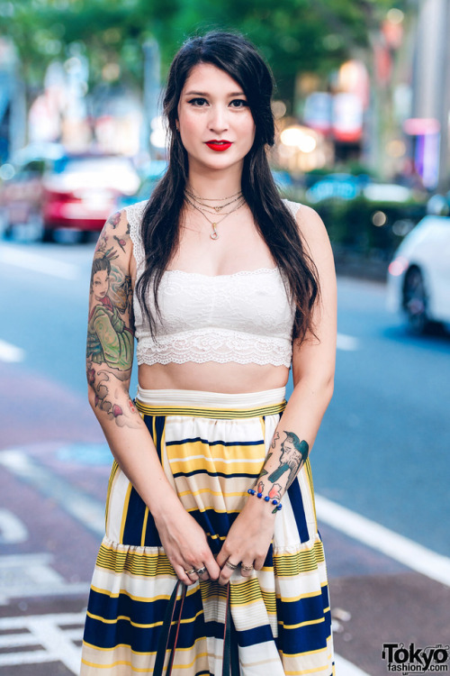 Tokyo-based lingerie model Miu Tran on the street in Harajuku wearing a One Spo lace top, striped mi