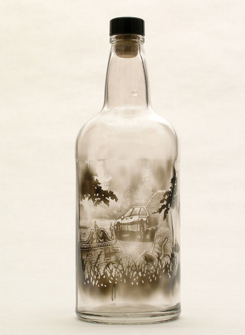 edens-blog:  beben-eleben:  Jim Dingilian proves that a creative and skillful artist can create works of art with just about anything. By coating the interior of empty glass bottles with black smoke and then carefully brushing it away with tools mounted