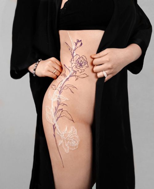 ig: pauline.tattoo flower;outline;rib;rose;thigh;white