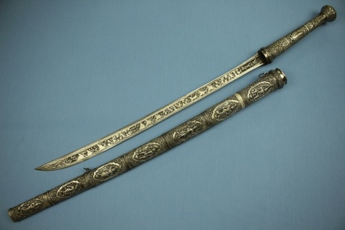 Fine silver decorated Burmese dha, 19th century.from Swords and Antique Weapons