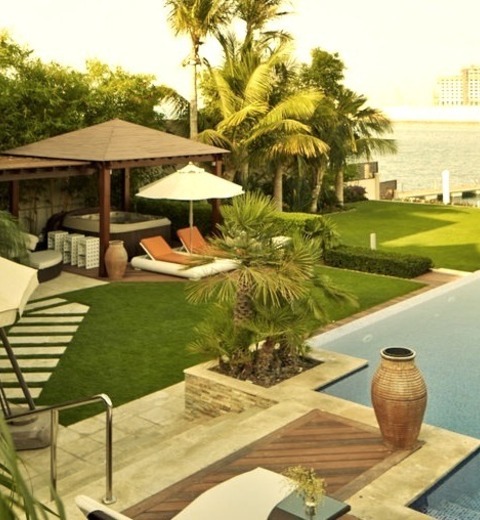 Mediterranean Landscape Photo Of A Large Mediterranean Full Sun Backyard Landscaping With Decking In