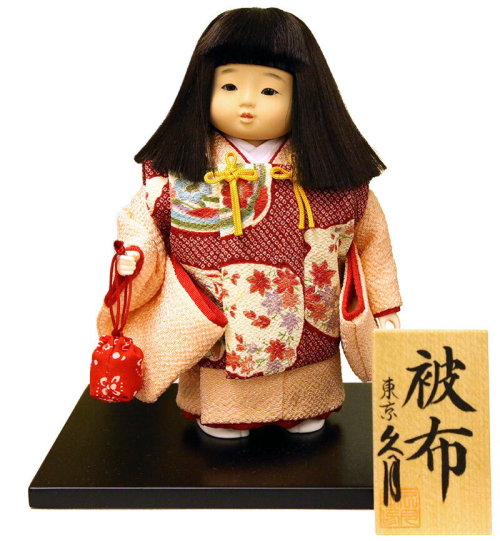 An Ichimatsu doll made by the Kyugetsu Company. The doll is wearing a vest called a hifu, which is o