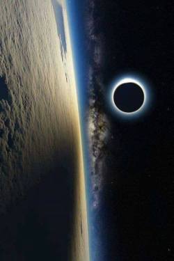 symparincsk:  ronsko:  the-wolf-and-moon:  Eclipse From The ISS  Oh wow  Amazing 