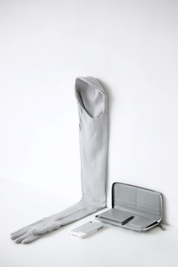 showstudio:  sleeve/glove Maison Martin Margiela, wallet Comme des Garçons via Net a Porter, iPhone case Pantone 