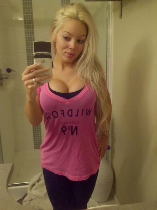 XXX sexy blonde selfshot her big real boobs and photo