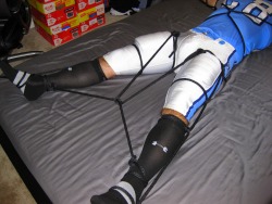 bondagejock:  Spread eagle tied in football gear.1 of 9Sub: Bondagejock  Dom: TheUAJock